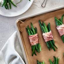 Green beans bundles with prociutto and herbs creamy sauce