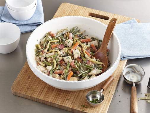 Gourmet bowl of vegetables and chicken with bacon & cheddar