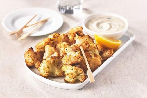 Indian style roasted cauliflower bites with tahini and cilantro sauce | Arctic Gardens